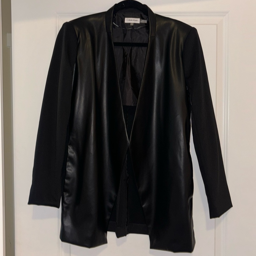 New Calvin Klein, pleather jacket with pockets. Beautiful quality.
